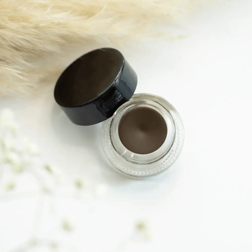 MIANIMED Premium skincare product in a glass jar with a black lid on a white background.