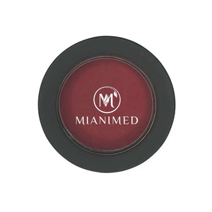 MIANIMED premium skincare product in a round container with a dark red center and black outer rim.