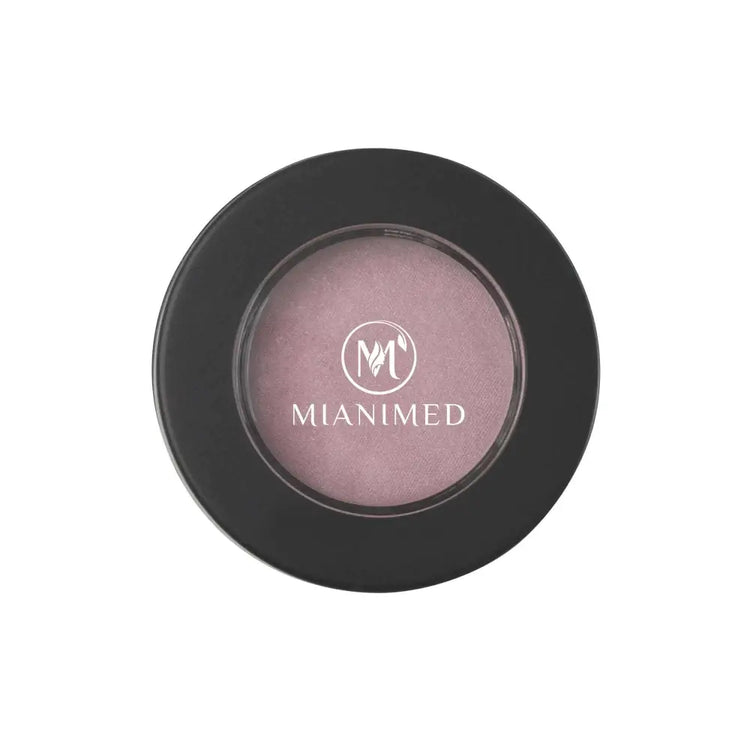 MIANIMED premium skincare product in black circular container with logo.